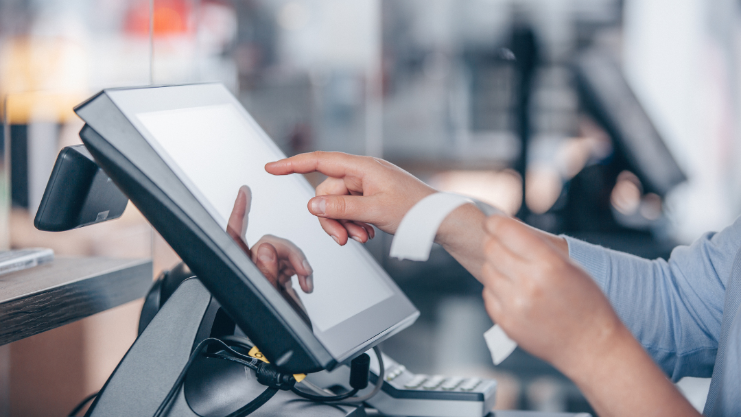 cashier using Point of sale system